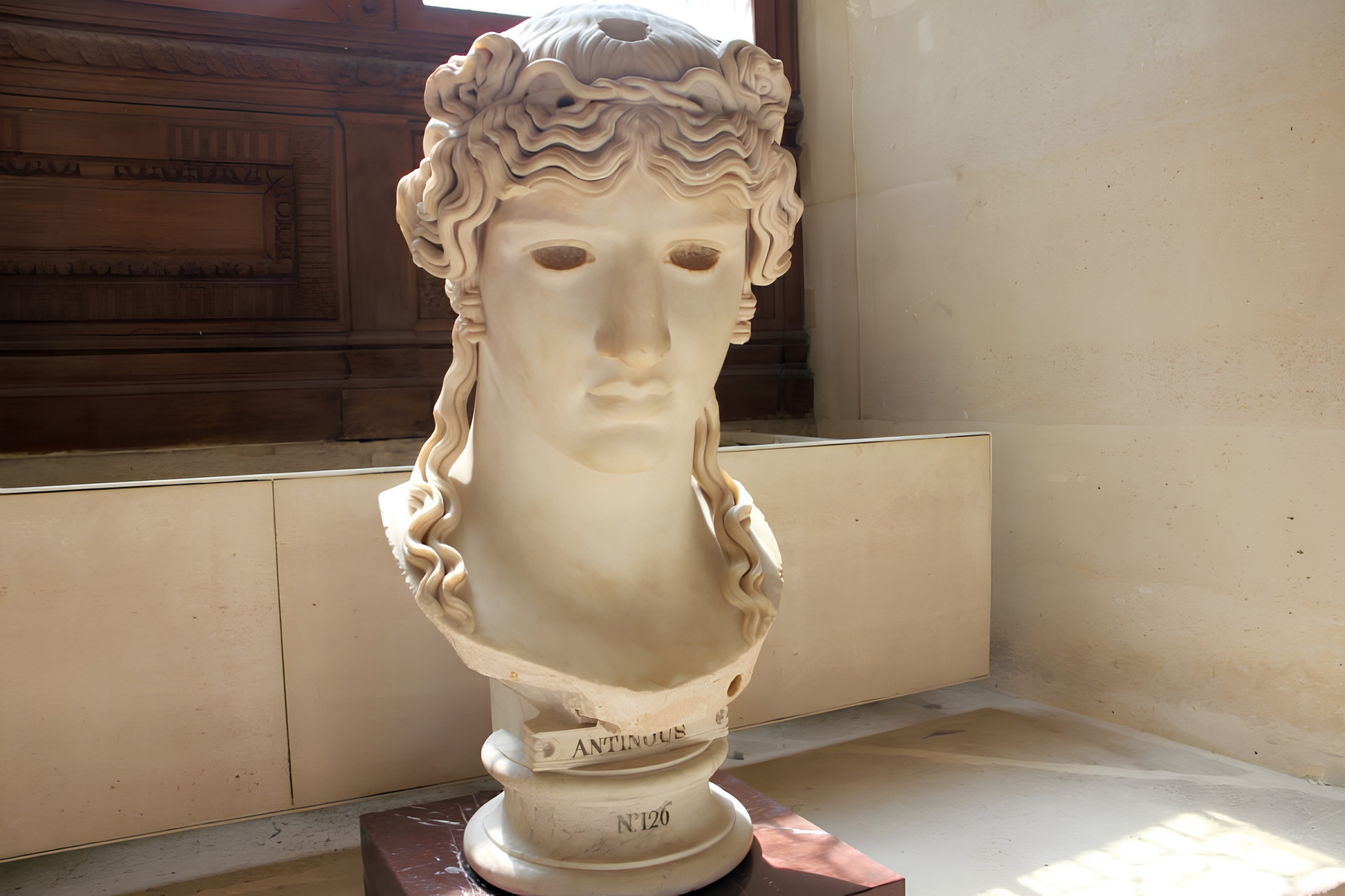 Marble bust of Antinous, known as the Antinous Mondragone, in the Louvre